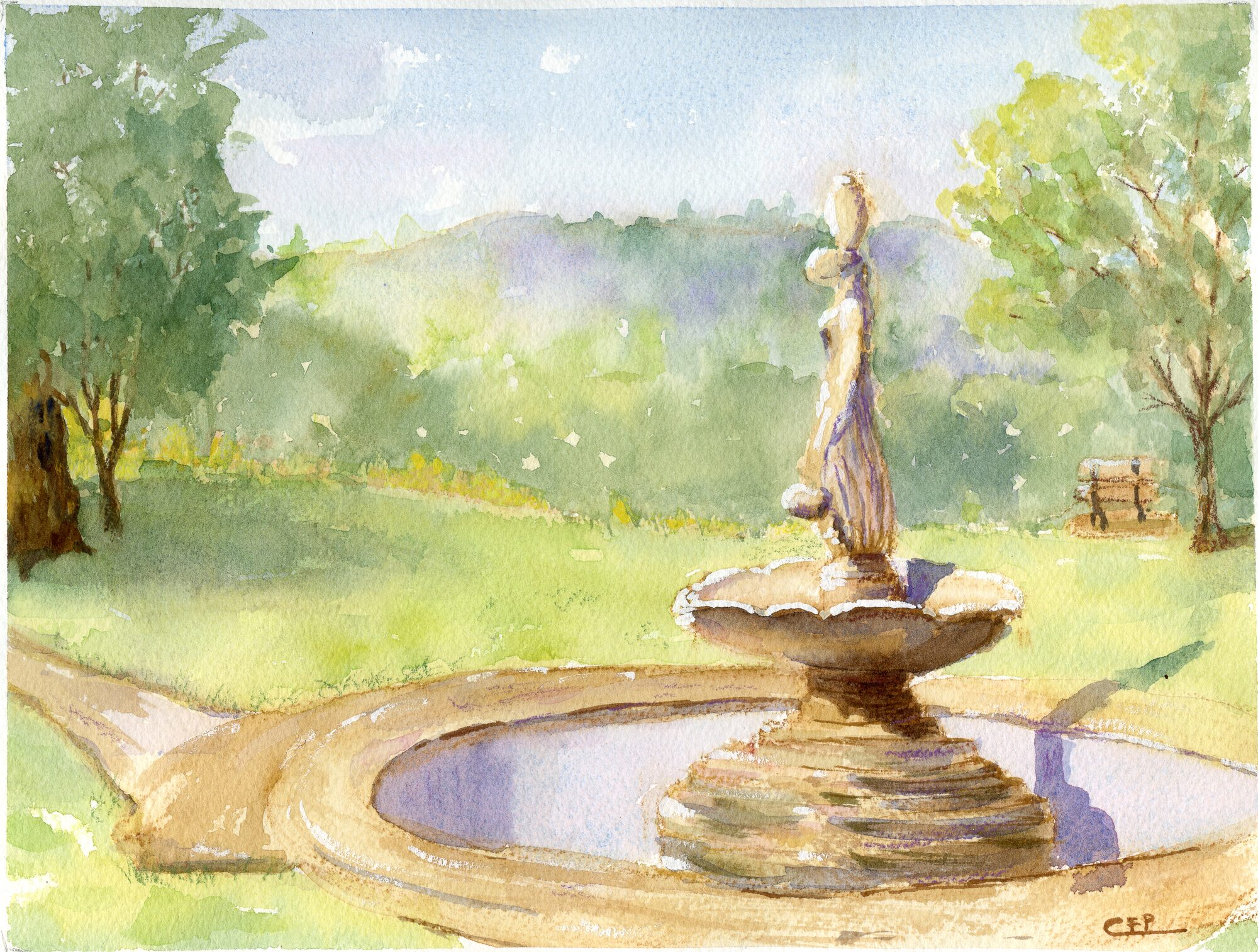 A stone fountain topped by a female statue, standing in a shallow oval pool beside a curving sand path, with a green lawn, trees and a bench beyond — watercolour by Claudia Fernandez